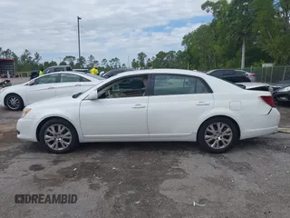 2010 Toyota Avalon XL with VIN 4T1BK3DB8AU354533, listed as a IAAI auction lot 41802797 with 117,956 mi miles and . Bid and sale history available at carsss.com. Image 14.