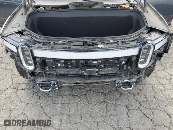 2022 Rivian R1S Launch Edition z VIN 7PDSGABL5NN001018, wystawiony jako Copart lot #56914725 z przebiegiem 26 156 mil mil oraz Szkoda całkowita • Salvage title. Historia ofert i sprzedaży dostępna na DreamBid. Obrazek 12.
