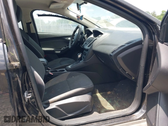 2012 Ford Focus SE with VIN 1FAHP3F21CL390012, listed as a IAAI auction lot 42634521 with 214,617 mi miles and . Bid and sale history available at DreamBid. Image 5.