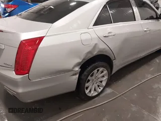 2014 Cadillac CTS Luxury AWD with VIN 1G6AX5SX3E0181029, listed as a IAAI auction lot 41895745 with 68,799 mi miles and . Bid and sale history available at DreamBid. Image 6.