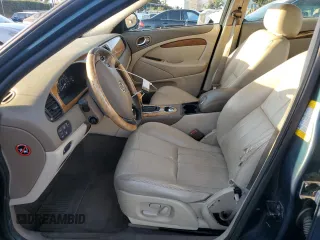 2003 Jaguar S-Type z VIN SAJEA01U73HM48330, wystawiony jako Copart lot #80128574 z przebiegiem Nie podano mil oraz Szkody całkowita. Historia ofert i sprzedaży dostępna na DreamBid. Obrazek 7.