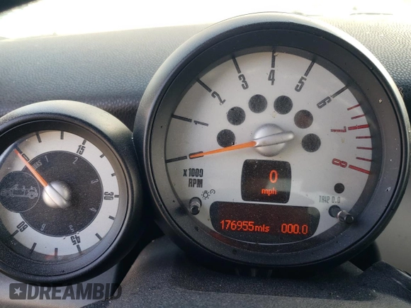 2011 MINI Convertible with VIN WMWZN3C54BT133246, listed as a Copart auction lot 69780074 with 176,955 mi miles and Salvage title. Bid and sale history available at DreamBid. Image 9.