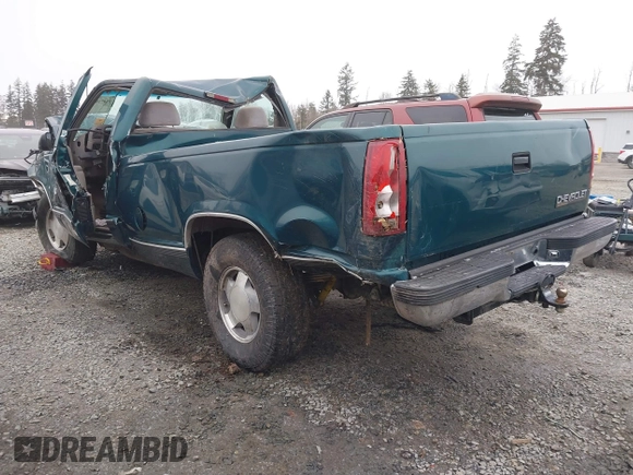 1998 Chevrolet Silverado 1500 with VIN 1GCEK14R6WZ273561, listed as a IAAI auction lot 41472999 with 128,338 mi miles and . Bid and sale history available at DreamBid. Image 3.