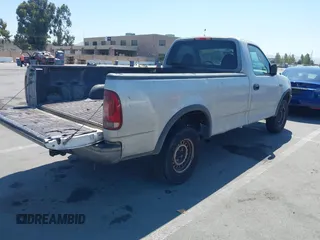 1997 Ford F-150 with VIN 1FTDF1828VKA26577, listed as a IAAI auction lot 42625435 with 310,779 mi miles and . Bid and sale history available at DreamBid. Image 4.