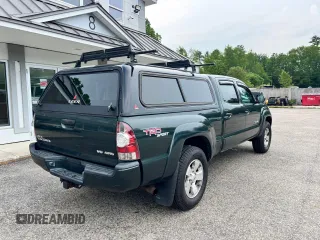 2009 Toyota Tacoma with VIN 3TMMU52N99M009737, listed as a Copart auction lot 60346815 with 216,703 mi miles and Clean title. Bid and sale history available at DreamBid. Image 4.