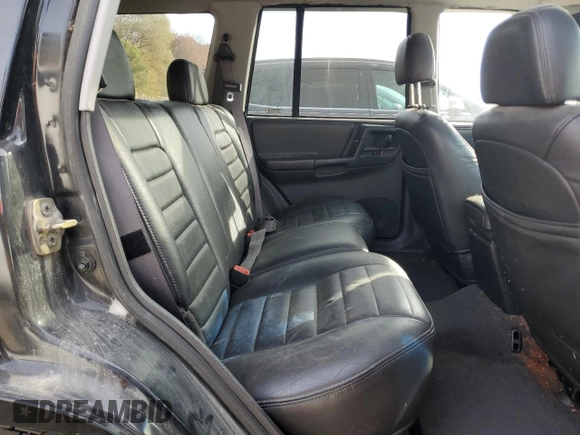 1998 Jeep Grand Cherokee Laredo with VIN 1J4GZ48YXWC299827, listed as a Copart auction lot 76898264 with 232,656 mi miles and Clean Title. Bid and sale history available at carsss.com. Image 11.