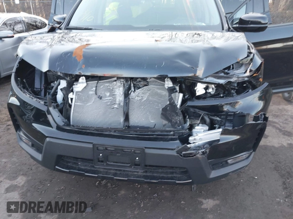 2024 Honda Ridgeline Sport with VIN 5FPYK3F14RB012334, listed as a IAAI auction lot 41542412 with 1,817 mi miles and . Bid and sale history available at DreamBid. Image 6.