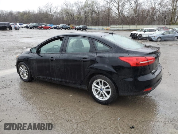 2017 Ford Focus SE with VIN 1FADP3F2XHL316724, listed as a Copart auction lot 52321155 with 137,005 mi miles and Salvage Title. Bid and sale history available at DreamBid. Image 2.