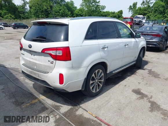 2014 Kia Sorento SX z VIN 5XYKWDA70EG541044, wystawiony jako IAAI lot #42301841 z przebiegiem 196 550 mil mil oraz . Historia ofert i sprzedaży dostępna na DreamBid. Obrazek 4.