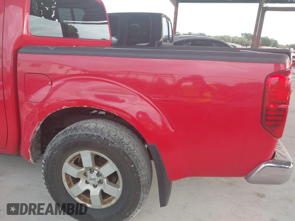 2005 Nissan Frontier SE with VIN 1N6AD07U95C463775, listed as a IAAI auction lot 42783610 with 196,085 mi miles and . Bid and sale history available at DreamBid. Image 12.