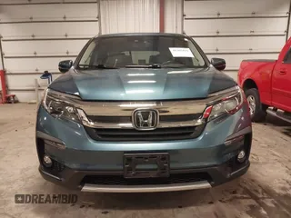 2019 Honda Pilot EX-L with VIN 5FNYF6H5XKB094879, listed as a IAAI auction lot 41265415 with 58,700 mi miles and . Bid and sale history available at DreamBid. Image 13.