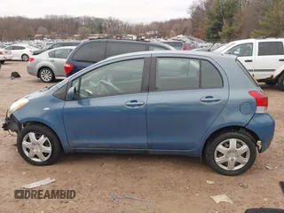 2009 Toyota Yaris with VIN JTDKT903195255240, listed as a IAAI auction lot 41650800 with 168,991 mi miles. Bid and sale history available at carsss.com. Image 14.