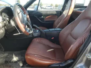 2002 Mazda MX-5 Miata Cloth with VIN JM1NB353X20228420, listed as a Copart auction lot 47949235 with 94,341 mi miles and Salvage title. Bid and sale history available at DreamBid. Image 7.