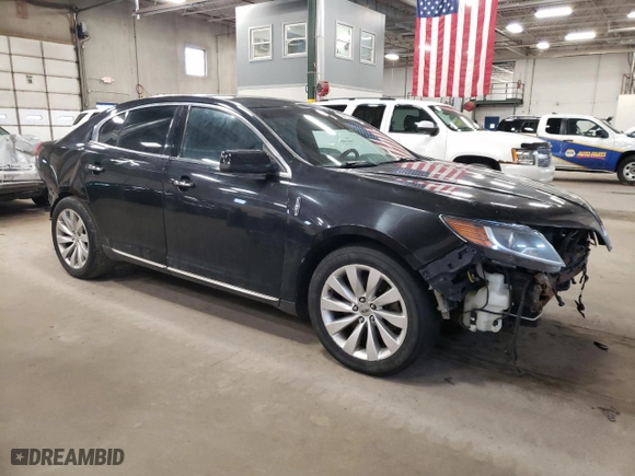 2014 Lincoln MKS with VIN 1LNHL9EK4EG606050, listed as a Copart auction lot 53412495 with 213,371 mi miles and Clean Title. Bid and sale history available at carsss.com. Image 4.