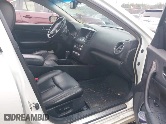 2014 Nissan Maxima S with VIN 1N4AA5AP5EC909115, listed as a IAAI auction lot 42016052 with 125,851 mi miles and . Bid and sale history available at DreamBid. Image 5.