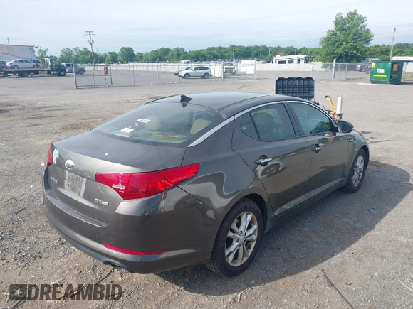 2013 Kia Optima EX with VIN 5XXGN4A78DG176690, listed as a IAAI auction lot 42196301 with 300,717 mi miles and . Bid and sale history available at DreamBid. Image 4.