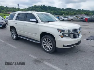 2015 Chevrolet Tahoe LTZ z VIN 1GNSKCKC7FR189723, wystawiony jako IAAI lot #42786350 z przebiegiem 177 343 mil mil oraz . Historia ofert i sprzedaży dostępna na DreamBid. Obrazek 1.