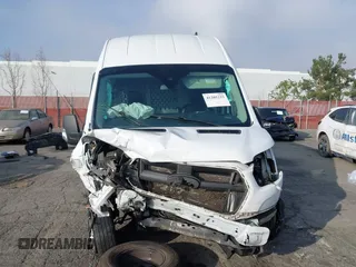 2021 Ford Transit Cargo z VIN 1FTBR3X82MKA18067, wystawiony jako IAAI lot #41205233 z przebiegiem 48 391 mil mil oraz . Historia ofert i sprzedaży dostępna na DreamBid. Obrazek 13.