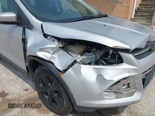 2014 Ford Escape SE with VIN 1FMCU9GX9EUD83148, listed as a IAAI auction lot 42449815 with 120,062 mi miles and . Bid and sale history available at DreamBid. Image 6.