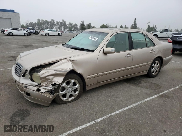2002 Mercedes-Benz E-Class with VIN WDBJF65J92B404315, listed as a Copart auction lot 75481094 with 87,383 mi miles and Salvage Title. Bid and sale history available at carsss.com. Image 1.