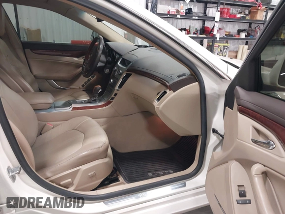 2008 Cadillac CTS AWD w/1SB with VIN 1G6DS57V880139916, listed as a IAAI auction lot 41302359 with 118,078 mi miles. Bid and sale history available at carsss.com. Image 5.