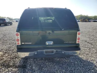 2004 Chevrolet Tahoe LS z VIN 1GNEC13Z24R174609, wystawiony jako Copart lot #52234105 z przebiegiem 182 306 mil mil oraz Szkoda całkowita • Salvage title. Historia ofert i sprzedaży dostępna na DreamBid. Obrazek 6.