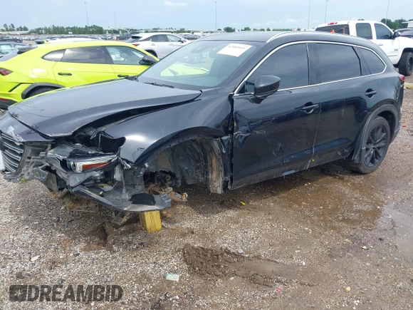 2018 Mazda CX-9 Grand Touring with VIN JM3TCADY3J0228643, listed as a IAAI auction lot 42481641 with 121,714 mi miles and . Bid and sale history available at DreamBid. Image 2.