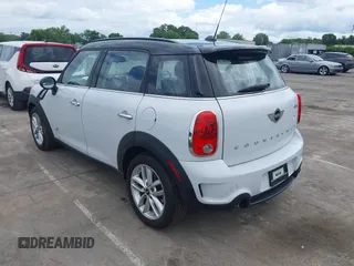 2014 MINI Countryman S z VIN WMWZC5C57EWP38396, wystawiony jako IAAI lot #42400771 z przebiegiem 147 302 mil mil oraz . Historia ofert i sprzedaży dostępna na DreamBid. Obrazek 3.