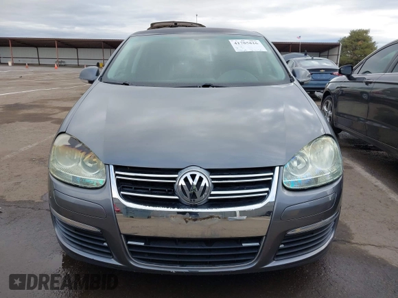 2009 Volkswagen Jetta S with VIN 3VWJZ71K49M053603, listed as a IAAI auction lot 41785816 with 100,065 mi miles and . Bid and sale history available at DreamBid. Image 12.