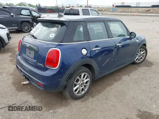 2017 MINI Hardtop 4 Door Cooper S z VIN WMWXU3C3XH2F49313, wystawiony jako IAAI lot #42137594 z przebiegiem 87 865 mil mil oraz . Historia ofert i sprzedaży dostępna na DreamBid. Obrazek 4.