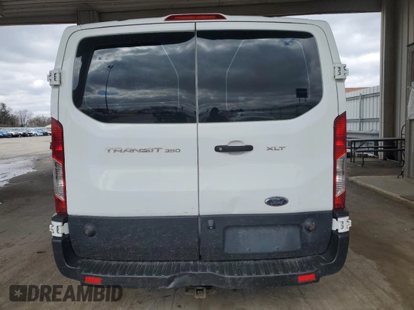 2019 Ford Transit Passenger XL z VIN 1FBZX2ZM6KKA60154, wystawiony jako Copart lot #52922675 z przebiegiem Nie podano mil oraz Tytuł czysty. Historia ofert i sprzedaży dostępna na DreamBid. Obrazek 6.