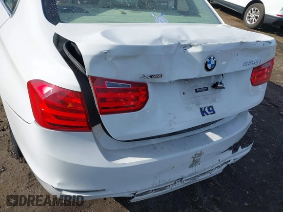 2014 BMW 3 Series 335i xDrive with VIN WBA3B9C52EJ466045, listed as a IAAI auction lot 41281384 with 136,329 mi miles. Bid and sale history available at carsss.com. Image 6.