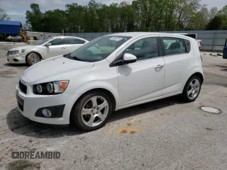2014 Chevrolet Sonic LTZ with VIN 1G1JE6SB9E4130200, listed as a Copart auction lot 55669475 with 104,635 mi miles and Salvage title. Bid and sale history available at DreamBid. Image 1.