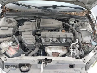 2005 Honda Civic Cpe VP with VIN 1HGEM21105L058145, listed as a IAAI auction lot 42137371 with 207,361 mi miles. Bid and sale history available at carsss.com. Image 10.
