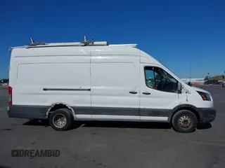 2021 Ford Transit Cargo with VIN 1FTBF4X82MKA74167, listed as a IAAI auction lot 40415831 with 63,943 mi miles and . Bid and sale history available at DreamBid. Image 14.
