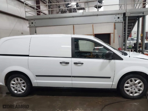 2014 Ram Cargo Van Tradesman with VIN 2C4JRGAG5ER341034, listed as a IAAI auction lot 41194609 with 156,772 mi miles. Bid and sale history available at carsss.com. Image 14.