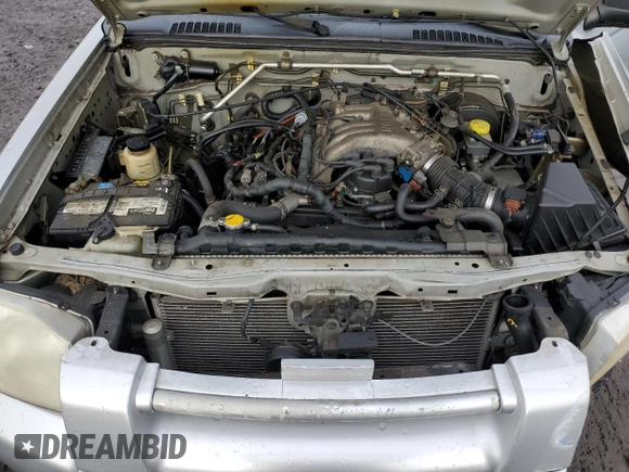 2004 Nissan Frontier XE with VIN 1N6ED29X94C415650, listed as a Copart auction lot 42880085 with 148,907 mi miles and Salvage title. Bid and sale history available at DreamBid. Image 13.