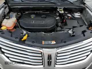 2015 Lincoln MKC z VIN 5LMCJ2A94FUJ10689, wystawiony jako Copart lot #49952045 z przebiegiem 128 040 mil mil oraz Szkoda całkowita • Salvage title. Historia ofert i sprzedaży dostępna na DreamBid. Obrazek 11.