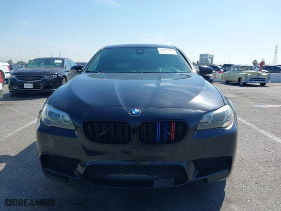 2013 BMW M5 with VIN WBSFV9C54DC772568, listed as a IAAI auction lot 41866486 with 99,072 mi miles. Bid and sale history available at carsss.com. Image 6.