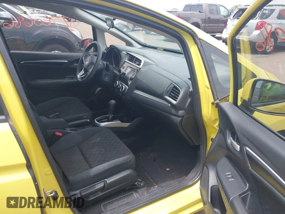 2015 Honda Fit LX z VIN 3HGGK5H58FM768970, wystawiony jako IAAI lot #42760686 z przebiegiem 89 531 mil mil oraz . Historia ofert i sprzedaży dostępna na DreamBid. Obrazek 5.