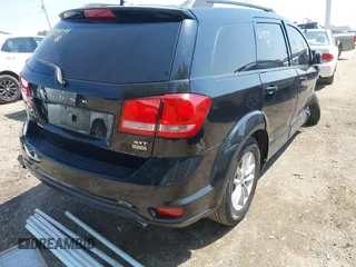 2015 Dodge Journey SXT with VIN 3C4PDCBG7FT605174, listed as a IAAI auction lot 42465723 with 172,130 mi miles and . Bid and sale history available at DreamBid. Image 4.