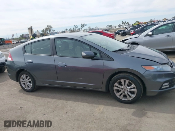 2012 Honda Insight EX z VIN JHMZE2H73CS000751, wystawiony jako IAAI lot #41687288 z przebiegiem 181 593 mil mil oraz . Historia ofert i sprzedaży dostępna na DreamBid. Obrazek 13.
