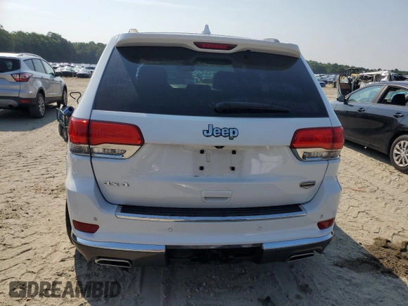 2014 Jeep Grand Cherokee Summit with VIN 1C4RJFJG9EC474781, listed as a Copart auction lot 60720325 with 64,546 mi miles and Salvage title. Bid and sale history available at DreamBid. Image 6.