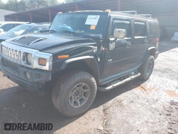 2003 Hummer H2 with VIN 5GRGN23U33H144379, listed as a IAAI auction lot 41452982 with 227,746 mi miles. Bid and sale history available at carsss.com. Image 17.
