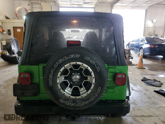 2002 Jeep Wrangler Sport with VIN 1J4FA49S72P701075, listed as a Copart auction lot 66894914 with 169,971 mi miles and Salvage Title. Bid and sale history available at carsss.com. Image 6.