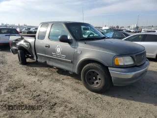 2003 Ford F-150 XL with VIN 1FTRX17L13NB48819, listed as a Copart auction lot 83693884 with 0 mi miles and Salvage Title. Bid and sale history available at carsss.com. Image 4.