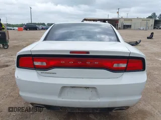 2014 Dodge Charger SE with VIN 2C3CDXBG4EH186881, listed as a IAAI auction lot 41952966 with 206,057 mi miles and . Bid and sale history available at DreamBid. Image 16.
