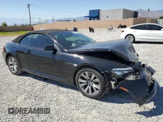 2009 BMW 6 Series 650i with VIN WBAEB53569C224337, listed as a Copart auction lot 68148974 with 75,057 mi miles and Salvage Title. Bid and sale history available at carsss.com. Image 4.