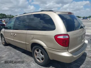 2001 Dodge Caravan ES with VIN 2B8GP54L51R198959, listed as a IAAI auction lot 41941050 with 208,396 mi miles and . Bid and sale history available at carsss.com. Image 6.