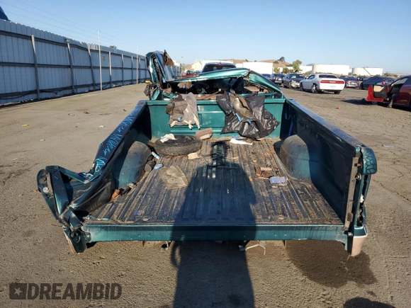 1996 Ford F-150 with VIN 1FTEF15Y0TLC02932, listed as a Copart auction lot 69009794 with Not provided miles and Salvage title. Bid and sale history available at DreamBid. Image 6.